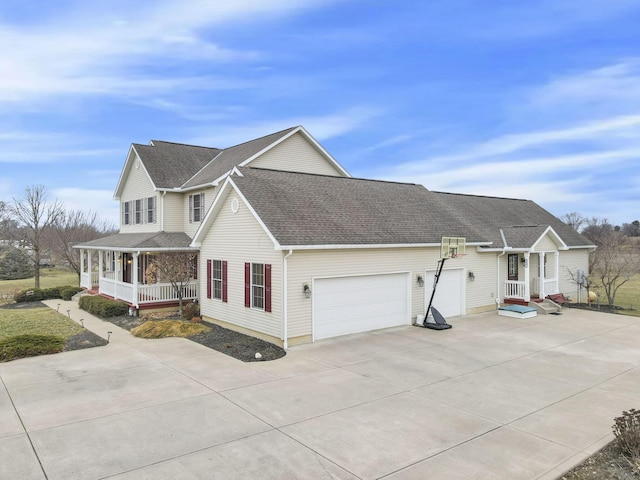 view of front facade featuring a porch and a garage