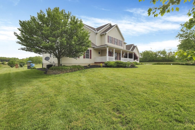 3628 State Route 361, Circleville, OH 43113 - view of side of property featuring a lawn and a porch