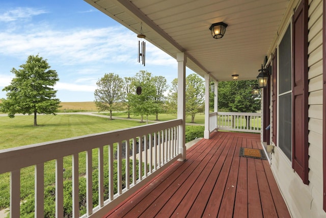 3628 State Route 361, Circleville, OH 43113 - wooden deck with covered porch and a lawn