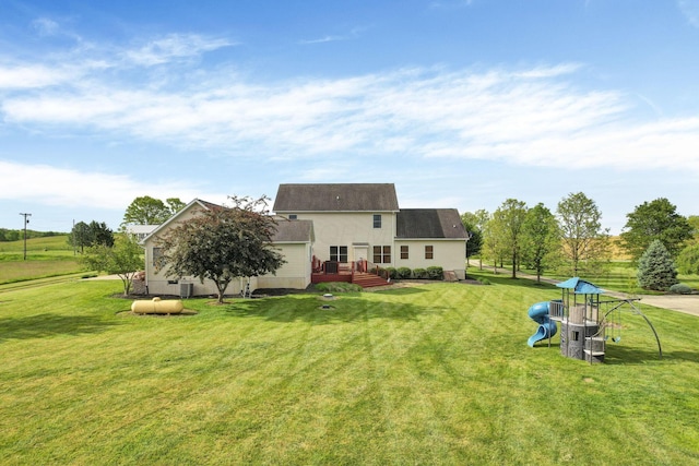 3628 State Route 361, Circleville, OH 43113 - rear view of house featuring a lawn and a deck