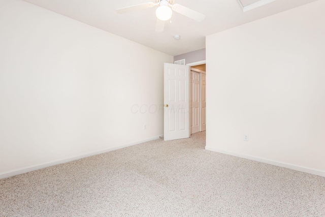 carpeted empty room with ceiling fan