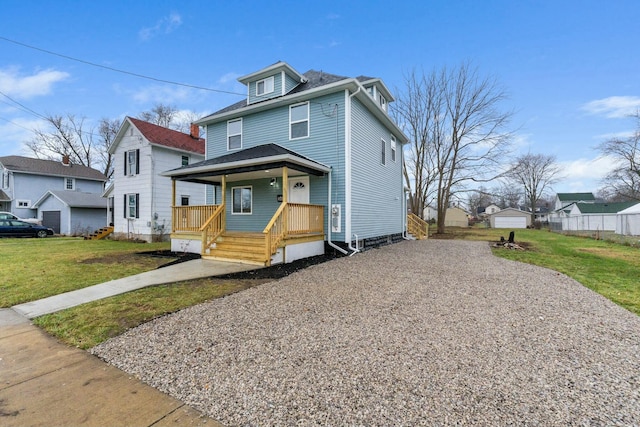 view of front of property with a porch and a front yard