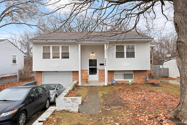 split foyer home featuring a garage