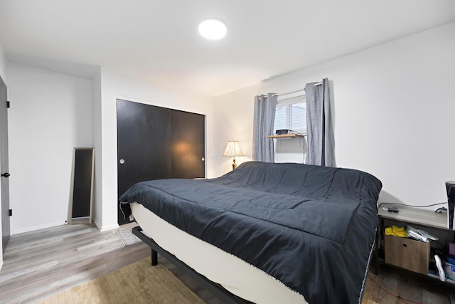 bedroom featuring light wood-type flooring