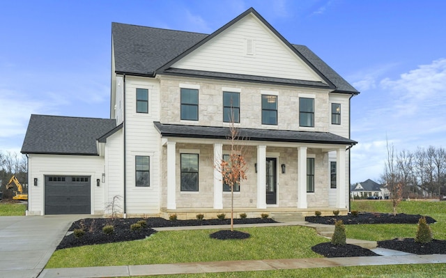 view of front of home featuring a porch, stone siding, a front lawn, and concrete driveway