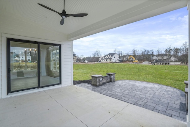 view of patio / terrace with a ceiling fan and a playground