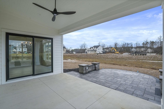 view of patio / terrace with a playground and ceiling fan