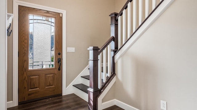 entryway with dark hardwood / wood-style floors