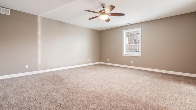 unfurnished room featuring carpet flooring and ceiling fan