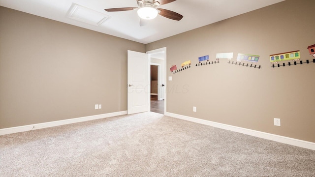 empty room with carpet flooring and ceiling fan