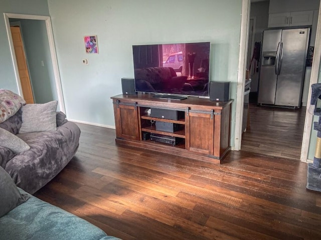 living room with dark hardwood / wood-style floors