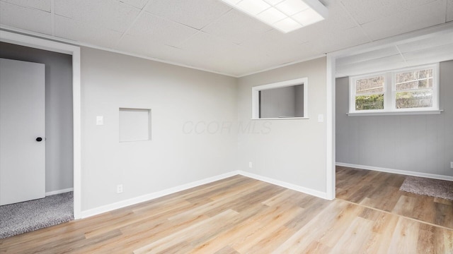 unfurnished room featuring light wood-type flooring