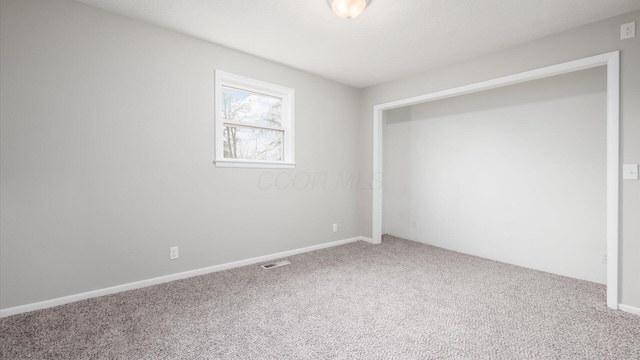 empty room featuring carpet