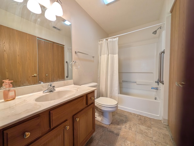 full bathroom with vanity, toilet, and shower / bath combo with shower curtain