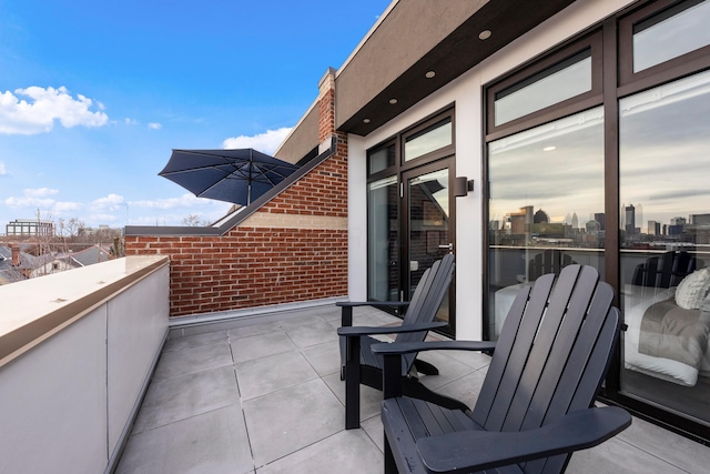 view of patio with a balcony