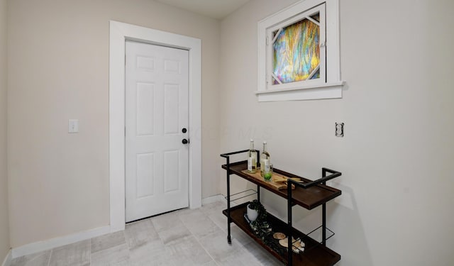 view of tiled foyer entrance