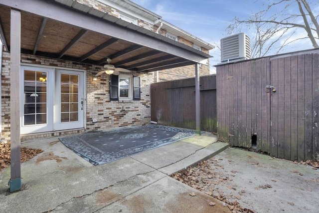 view of patio featuring central AC and ceiling fan
