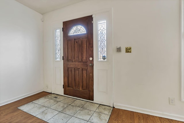 foyer with light hardwood / wood-style flooring