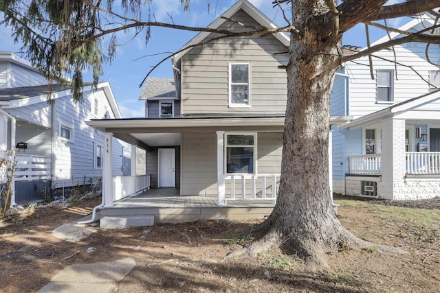 view of property with covered porch