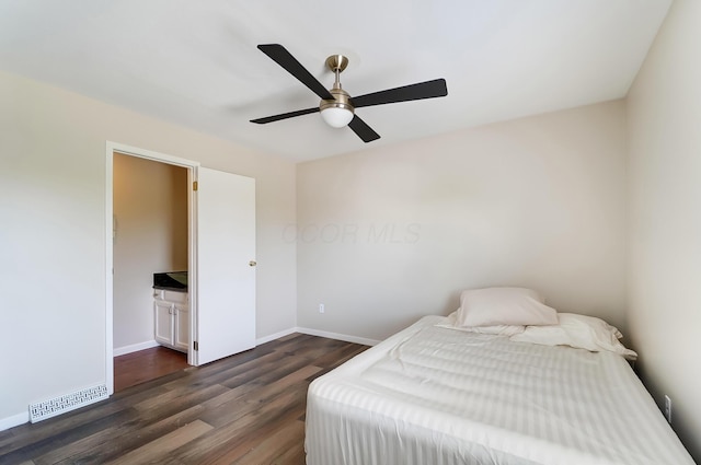 bedroom featuring ceiling fan and dark wood-type flooring