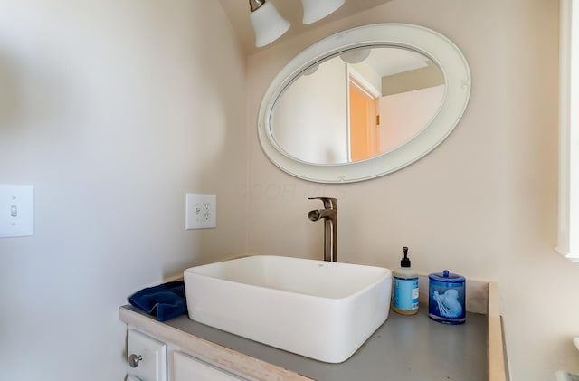 bathroom featuring vanity and concrete flooring