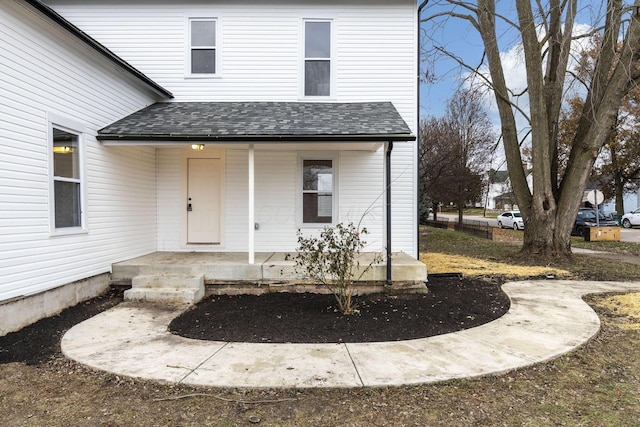 property entrance featuring covered porch