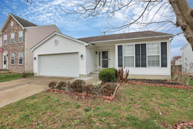 view of front of property with a garage and a front lawn