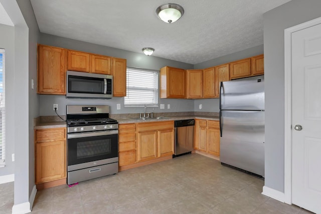 kitchen featuring sink and appliances with stainless steel finishes