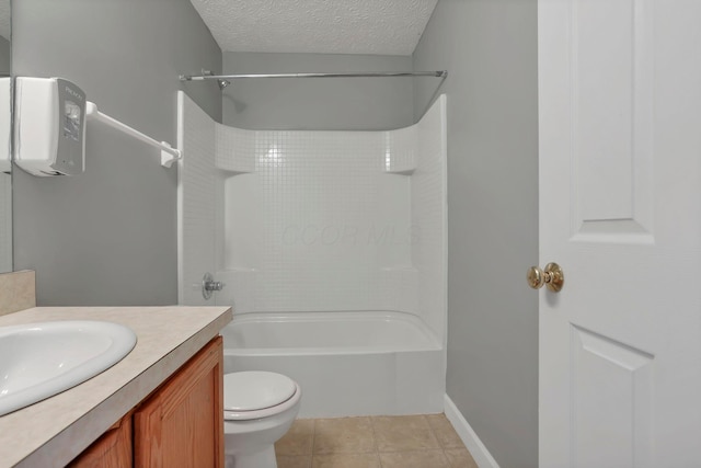 full bathroom with tile patterned flooring, a textured ceiling, toilet, shower / tub combination, and vanity