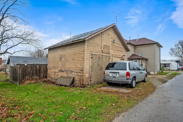 view of home's exterior featuring a lawn