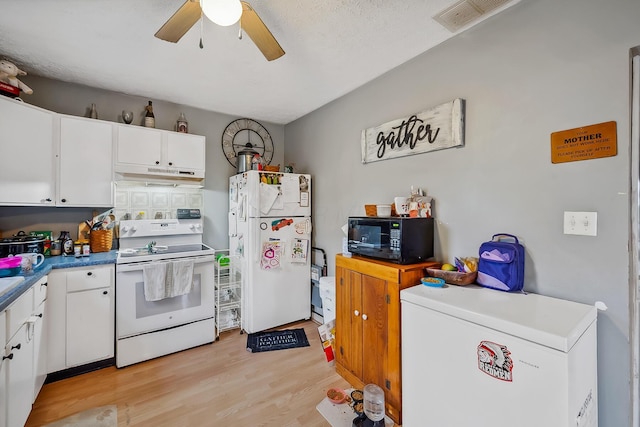 kitchen featuring white cabinetry, ceiling fan, light hardwood / wood-style floors, a textured ceiling, and white appliances