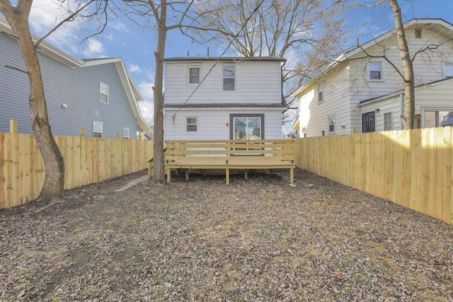 rear view of property with a deck