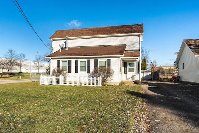 view of front of home with a front lawn