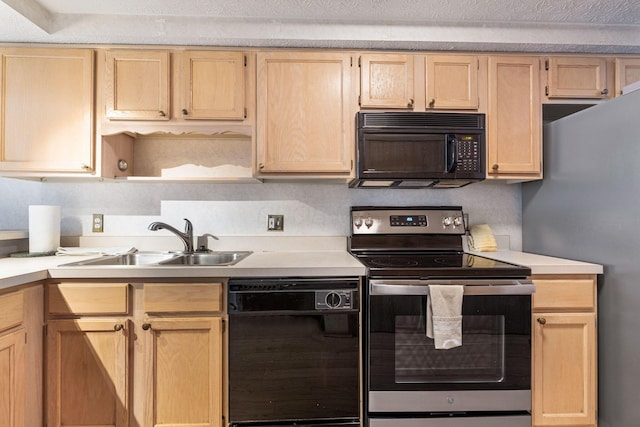 kitchen featuring open shelves, a sink, light countertops, light brown cabinetry, and black appliances