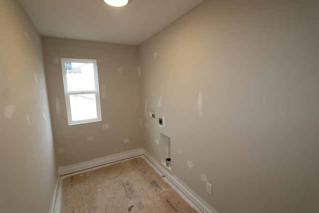 laundry area featuring electric dryer hookup and washer hookup