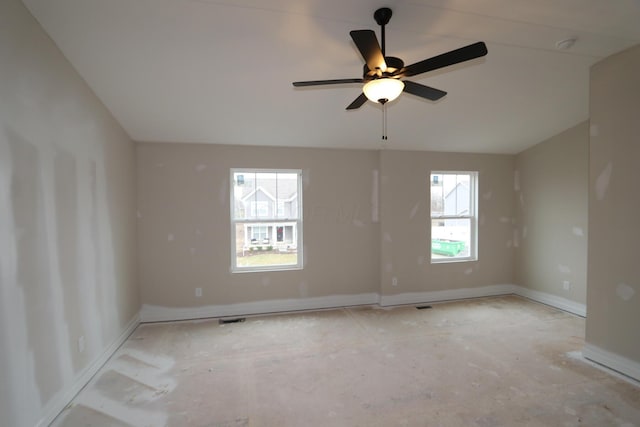 unfurnished room with ceiling fan