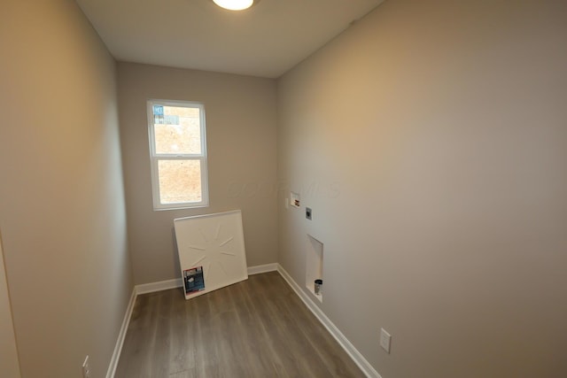 clothes washing area featuring laundry area, baseboards, dark wood-style floors, washer hookup, and electric dryer hookup