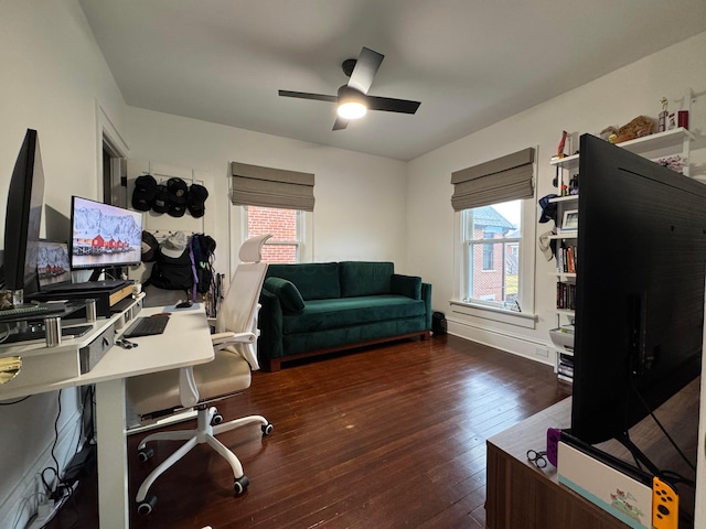 office area with dark hardwood / wood-style floors and ceiling fan