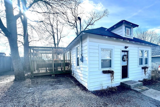 view of front of home with a wooden deck