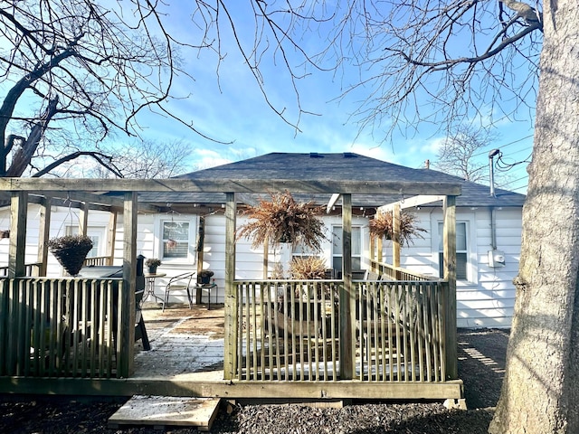 205 2nd St, Russells Point, OH 43348 - rear view of property with roof with shingles