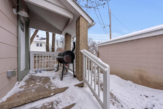 view of snow covered patio