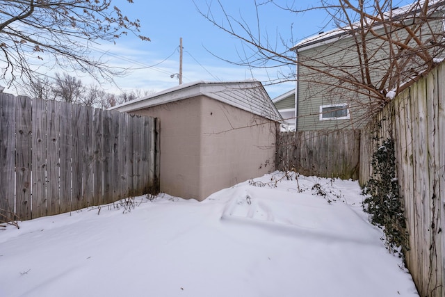 view of yard layered in snow