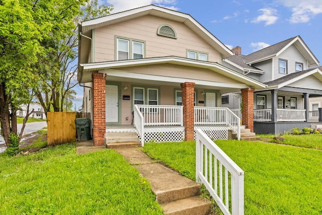 1146 S Champion Ave Unit 1148, Columbus, OH 43206 - townhome / multi-family property with covered porch and a front lawn