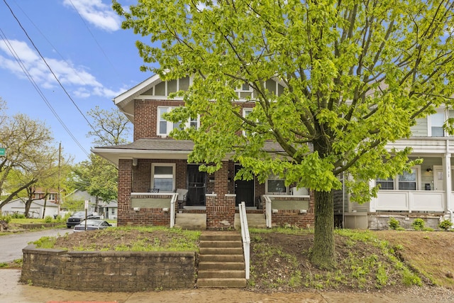 1060-1062 Linwood Ave, Columbus, OH 43206 - view of front of property featuring a porch and brick siding