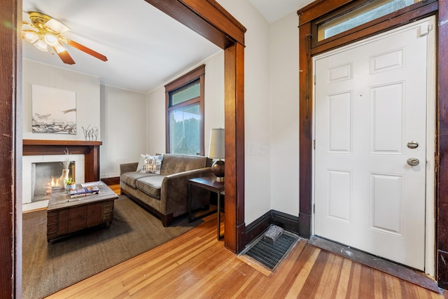 entryway featuring light hardwood / wood-style floors and ceiling fan