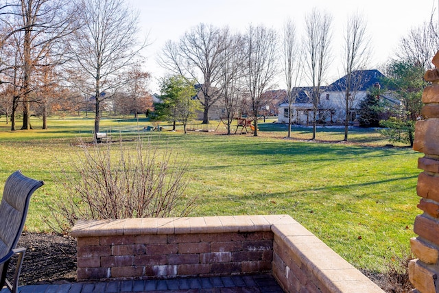 view of yard featuring playground community