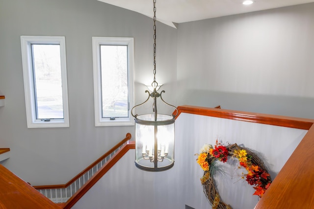 room details featuring recessed lighting and an inviting chandelier