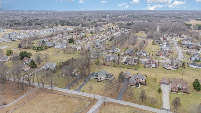 birds eye view of property with a residential view