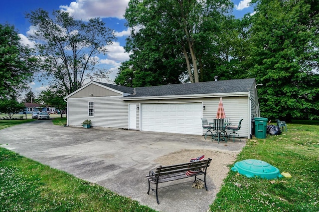 garage with a yard