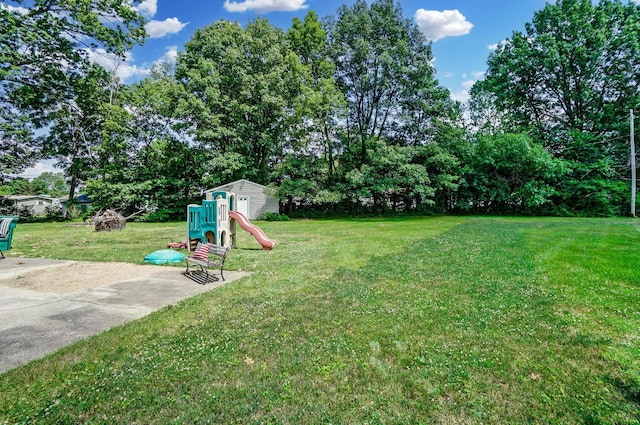 view of yard with a playground